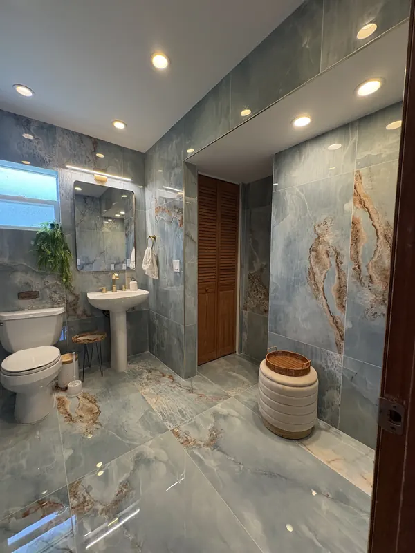 Blue marble-look bathroom remodel